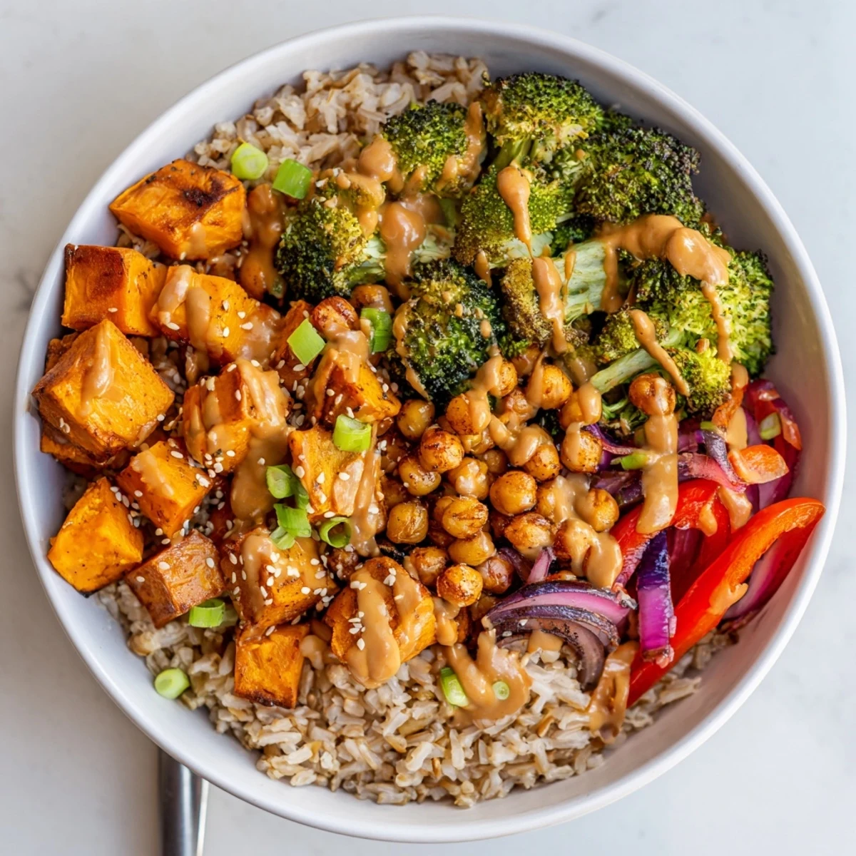 Vibrant Bold Sauce Drizzle Bowls loaded with roasted veggies and flavorful sauces.  