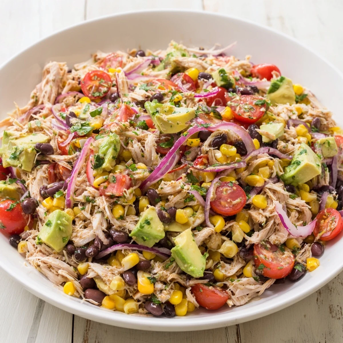 A vibrant bowl of Dense Southwestern Bean Salad, showcasing colorful Southwestern flavors and textures.