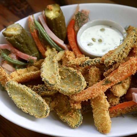 Delicious fried pickles serve alongside pickled-wrapped bites for a fun Pickle Lovers Meal.  