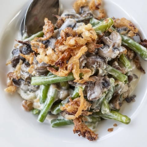 Nostalgic Old-School Green Bean Casserole with tender beans and savory mushroom sauce.  