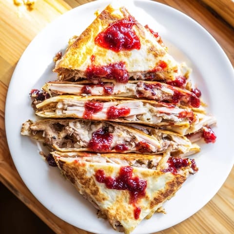 Warm Turkey, Stuffing & Cranberry Leftovers Tortilla Wrap, packed with holiday flavors perfectly folded.