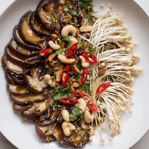A beautifully arranged Umami Bomb Asian Delight offers a medley of savory mushrooms and bold flavors.