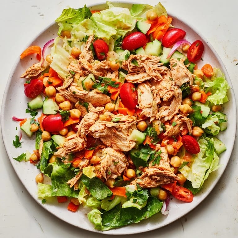 Homemade chicken salad with budget cuts, tossed in a light dressing, a delicious, easy meal.